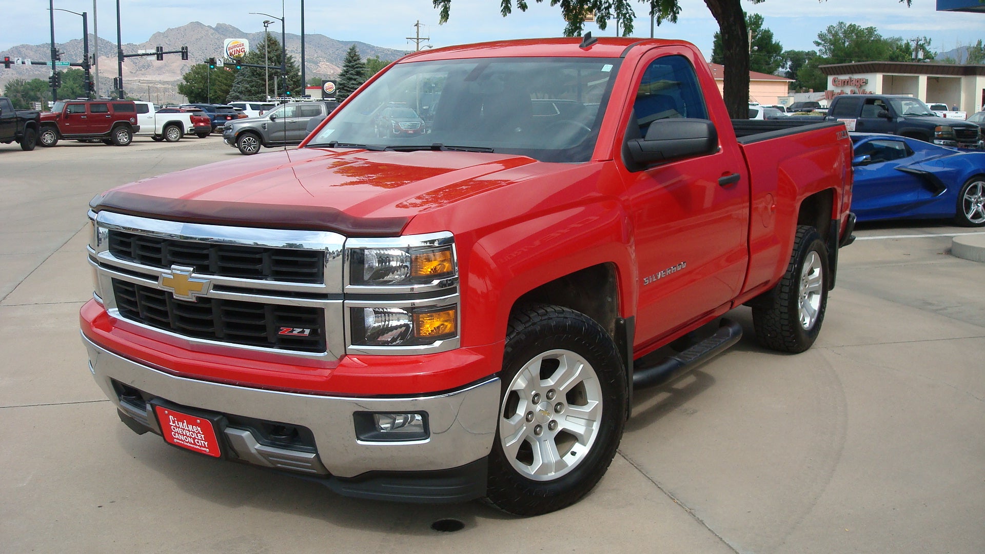 2014 Chevrolet Silverado 1500 LT in Victory Red — front three-quarter view