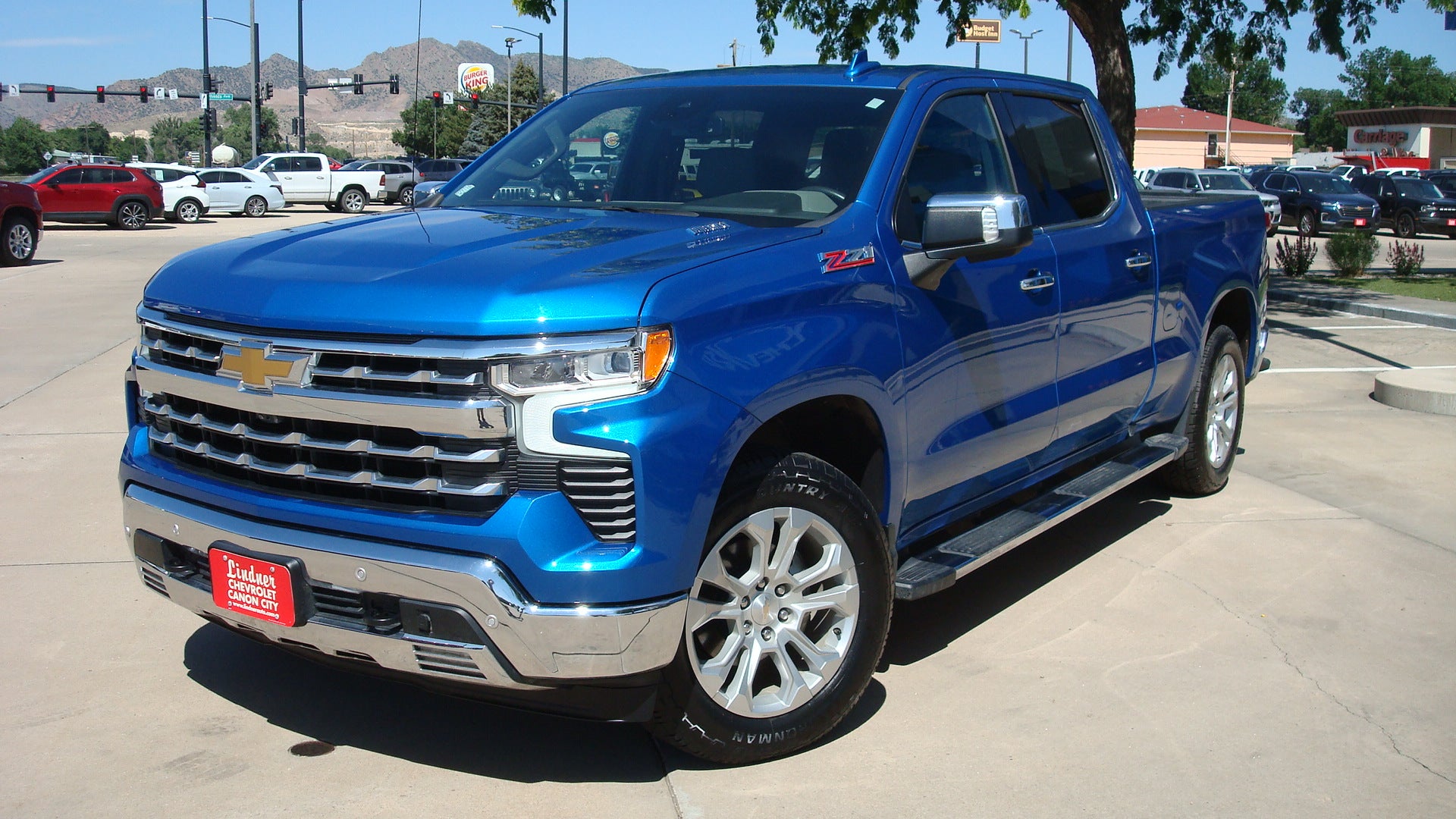 2023 Chevrolet Silverado 1500 LTZ in Glacier Blue Metallic — front three-quarter view