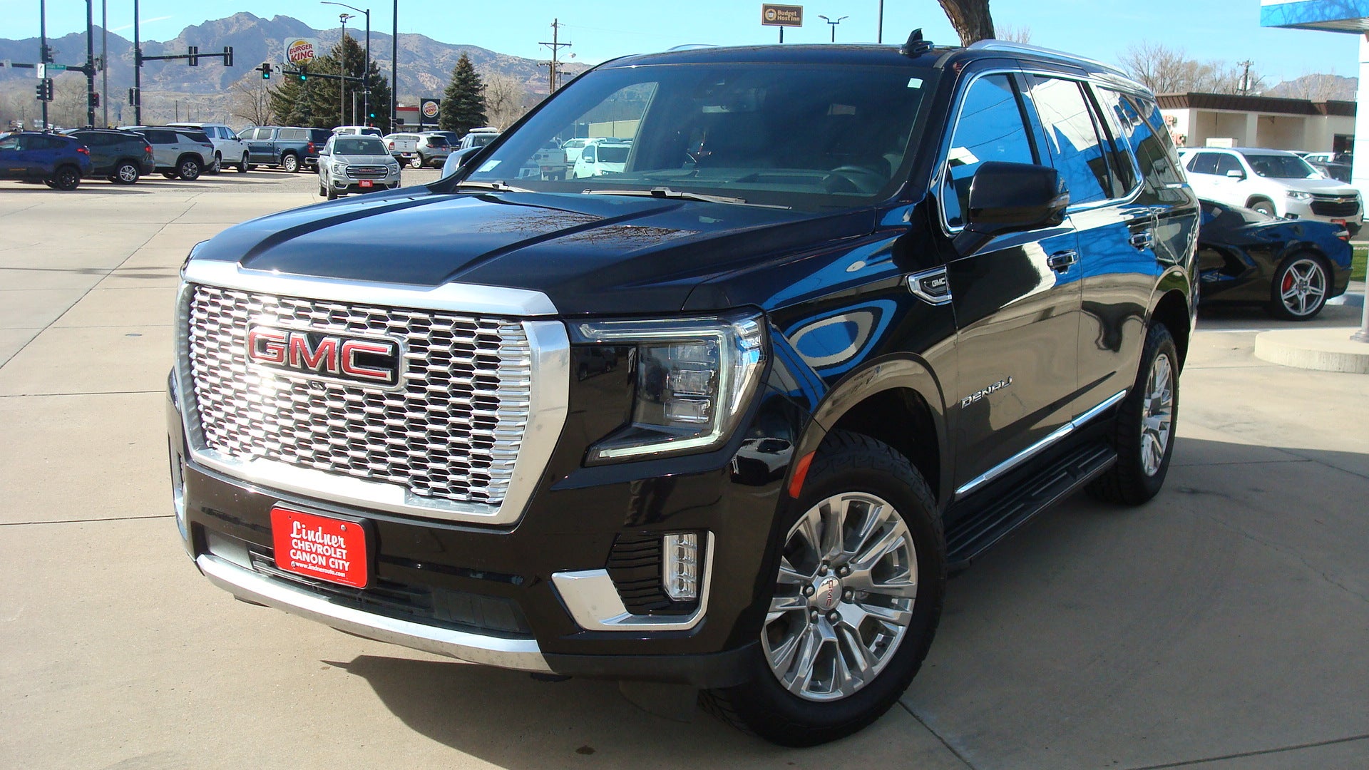 2022 GMC Yukon Denali in Onyx Black — front three-quarter view