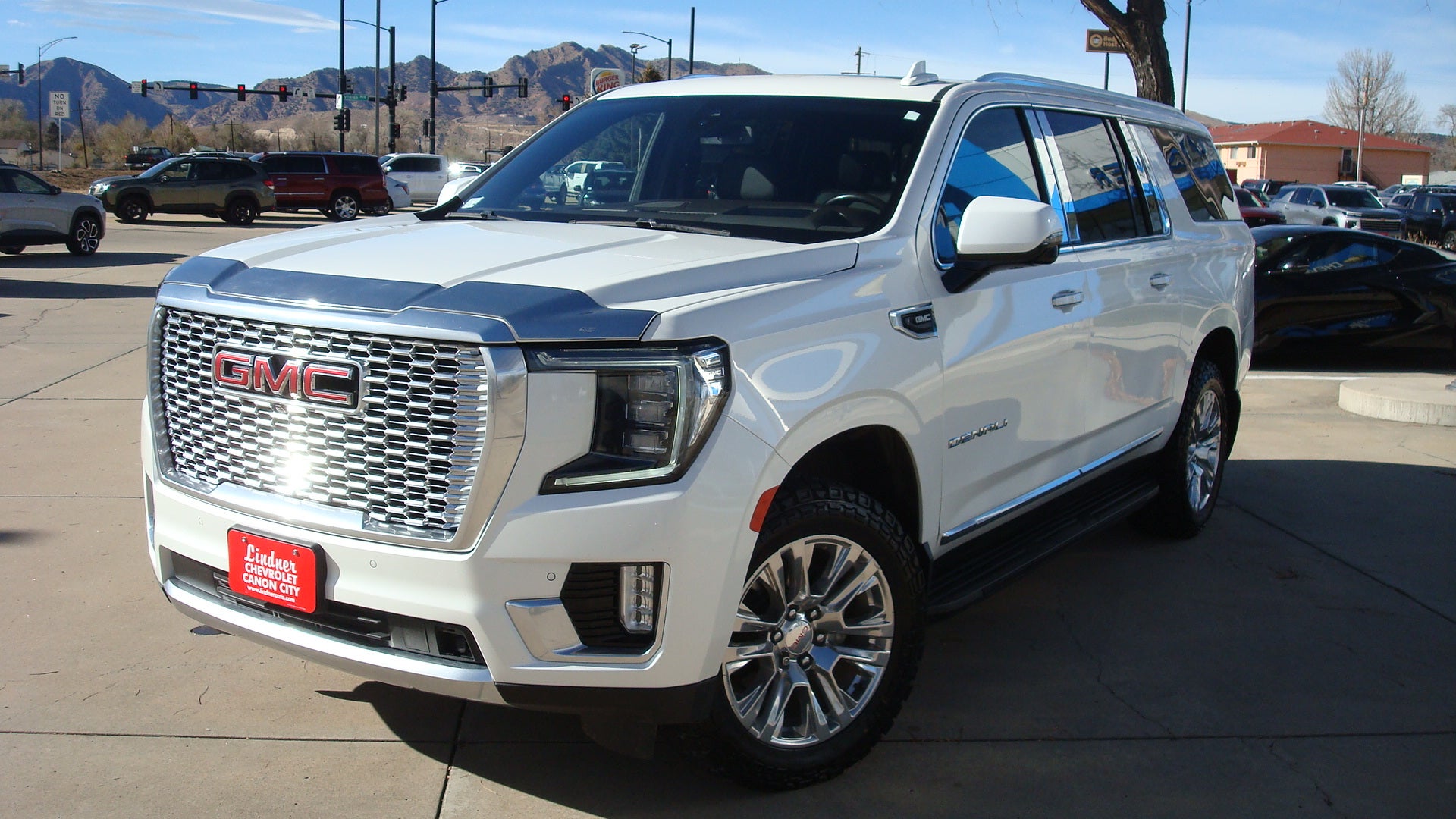 2022 GMC Yukon XL Denali in White Frost Tricoat — front three-quarter view