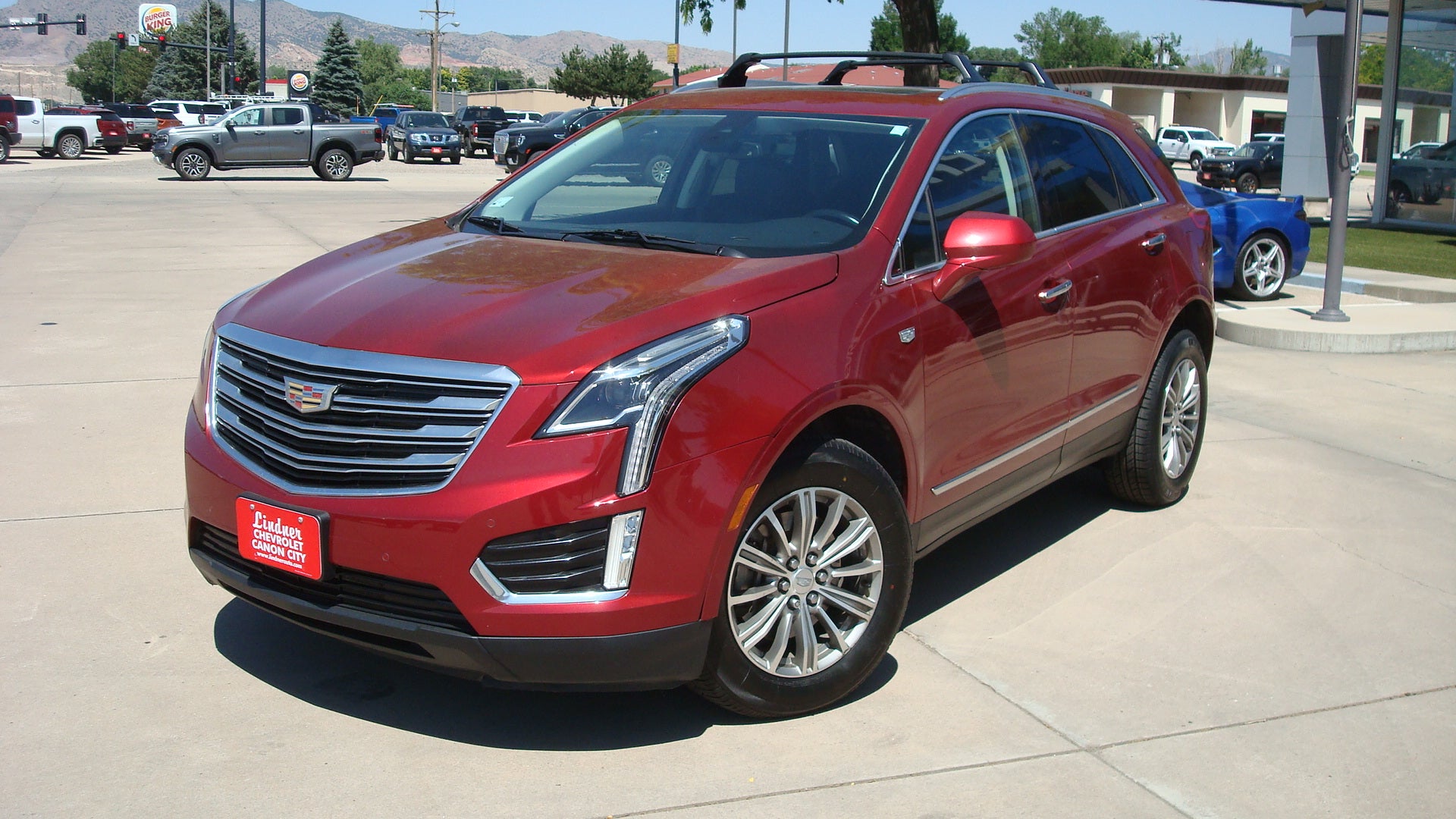 2019 Cadillac XT5 Luxury AWD in Red Horizon Tintcoat — front three-quarter view