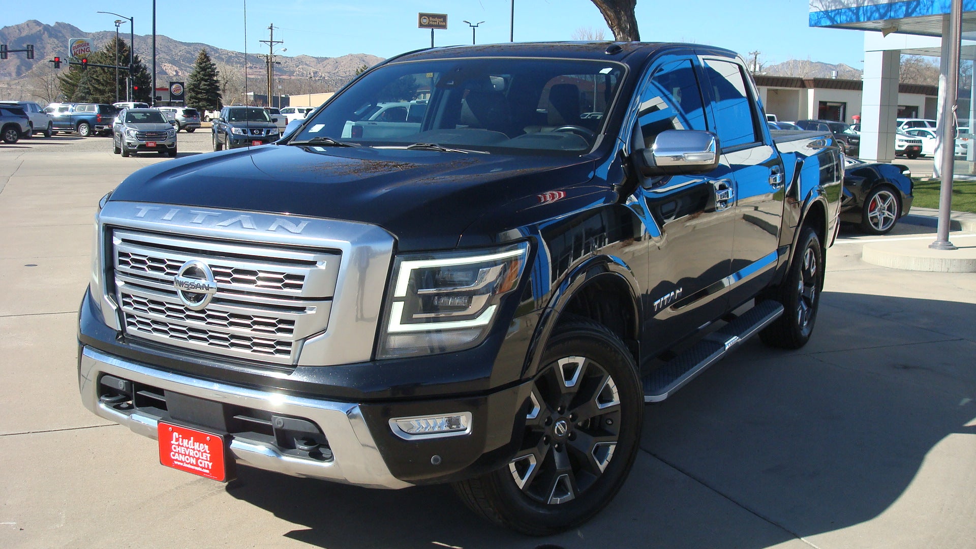 2021 Nissan Titan Platinum Reserve in Black — front three-quarter view