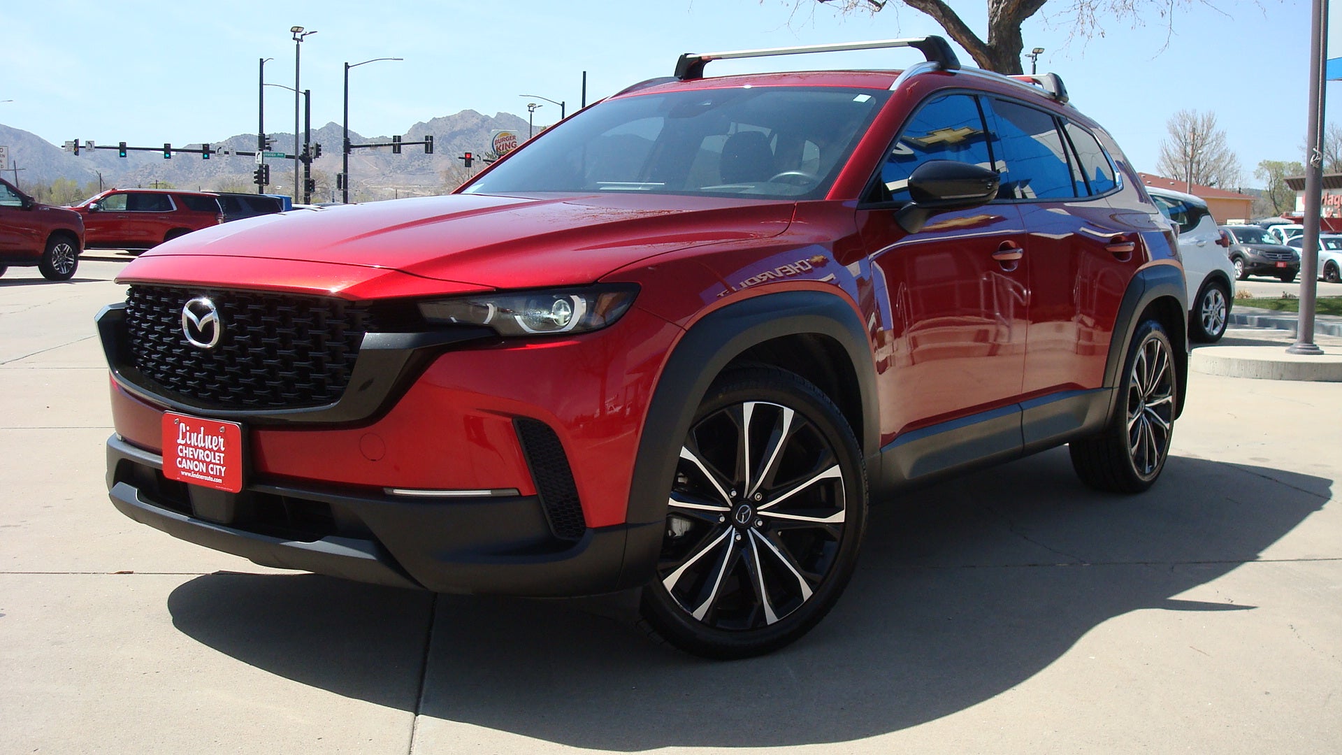 2023 Mazda Mazda CX-50 2.5 S Premium Plus Package in Red — front three-quarter view
