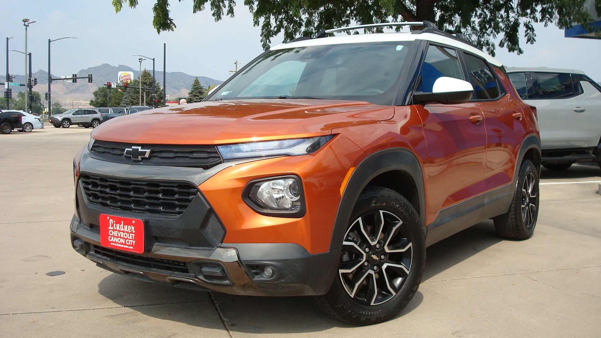 2022 Chevrolet Trailblazer ACTIV in Vivid Orange Metallic — front three-quarter view